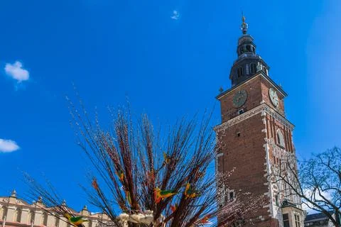 Traditional easter tree made of fluffy willow and wooden colorful birds near Stock Photos