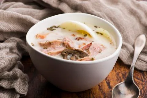 Traditional easter white borscht with eggs and sausage Stock Photos
