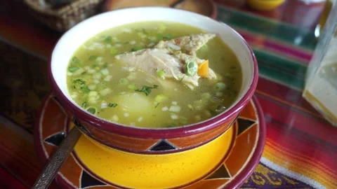 Traditional Ecuadorian soup on the rustic table Stock Footage 248565323