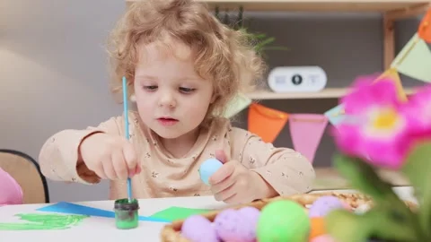 Traditional egg dyeing. Artistic spring decorations for Easter. Holiday cheer Stock Footage 293238683