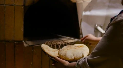 Traditional Egyptian flatbread are cooked in the oven Stock Footage 67992000