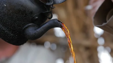 Traditional Egyptian tea cooked on the fire Stock Footage