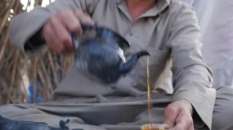Traditional Egyptian tea cooked on the fire Stock Footage