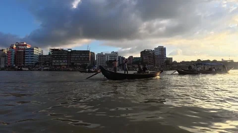 Traditional Engine boot ride in Burigonga Old Dhaka  chinl emplyment Stock-Footage 342366104
