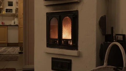 Traditional fireplace with burning fire inside cozy Finnish house interior Stock Footage 326216008
