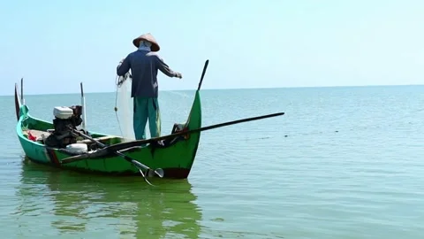 Traditional fishermen pulling nets Stock Footage 257173860