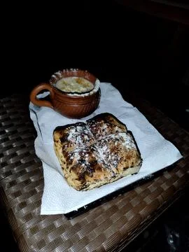 Traditional Flatbread and Clay Mug of Tea on Table Stock Photos