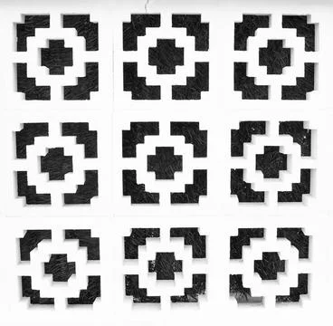 Traditional geometric pattern from an old white wall in Spain Stock Photos