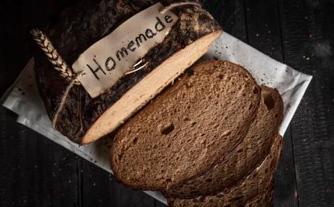 Traditional german rye-bread in low light. Crusty bread above view Stock Photos