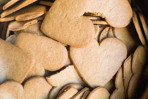 Traditional ginger bread biscuits in form of heart. Background or wallpaper in Stock Photos