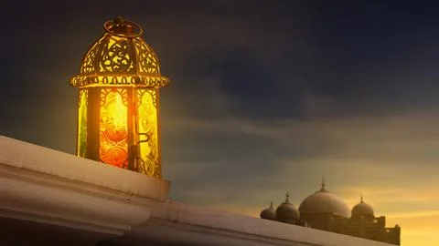 A traditional glowing Arabic lantern on a stone ledge with a blurred mosque.. Stock Illustration