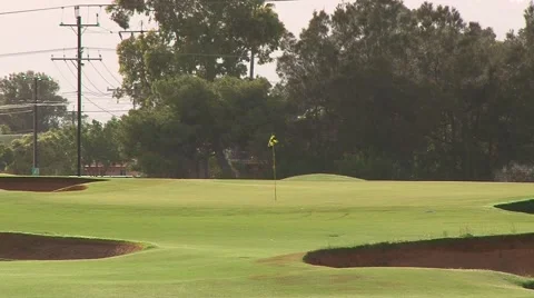 Traditional Golf Course Design Prevails Over Urban Encroachment Stock Footage 52456441