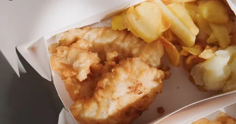 Traditional Greek fried cod fish in a delivery card box. Stock Footage 151938096