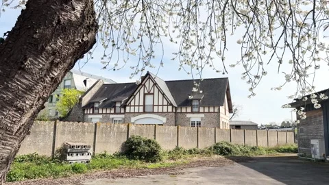 Traditional half-timbered house architecture in Pontorson, Normandy, France Stock Footage 340863197