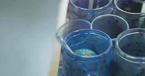 Traditional hand-painted Easter eggs. Wax patterns and colors on the eggs. Stock Footage 49821428