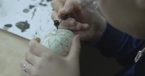 Traditional hand-painted Easter eggs. Wax patterns and colors on the eggs. Stock Footage 49821543