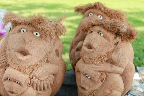 Traditional Handcrafted Coconut Shell Monkey Statues Tanah Lot Bali Closeup Фото