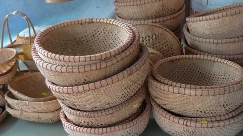 Traditional handcrafted flat bamboo baskets, commonly used in Asia Stock Footage 333450746