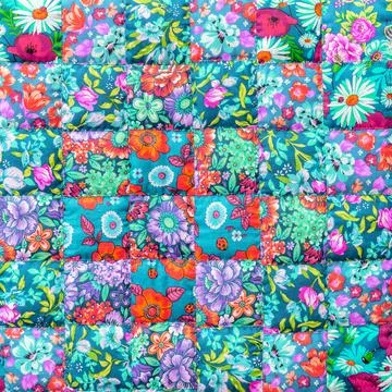 Traditional handmade patchwork with geometric flower pattern Stock Photos