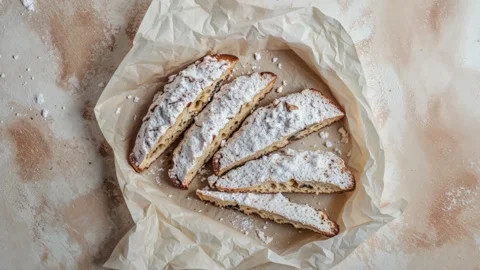 Traditional Holiday Stollen Bread with Powdered Sugar and Pinecones Stock Footage 294508441