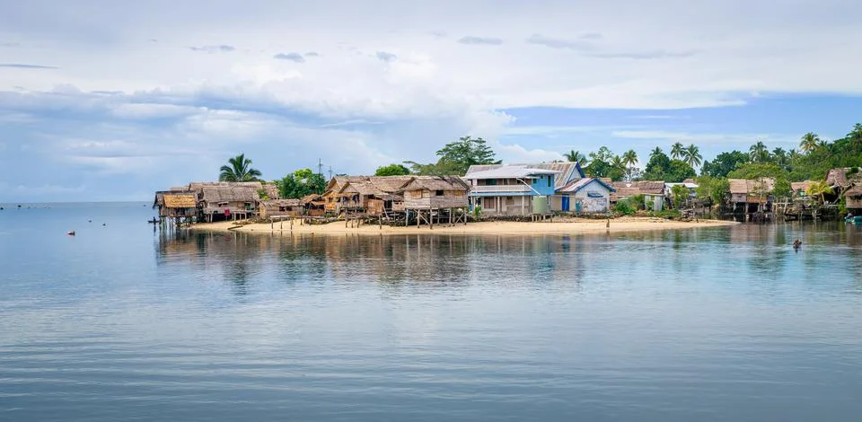 Traditional houses on Auki harbour in Malaita province of the Solomon Islands. Stock Photos