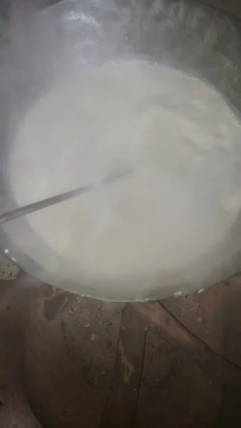 Traditional Indian Method of Making Khoya from Milk on Chulha Video stock 326207022