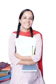Traditional indian student smiling with application form. Stock Photos