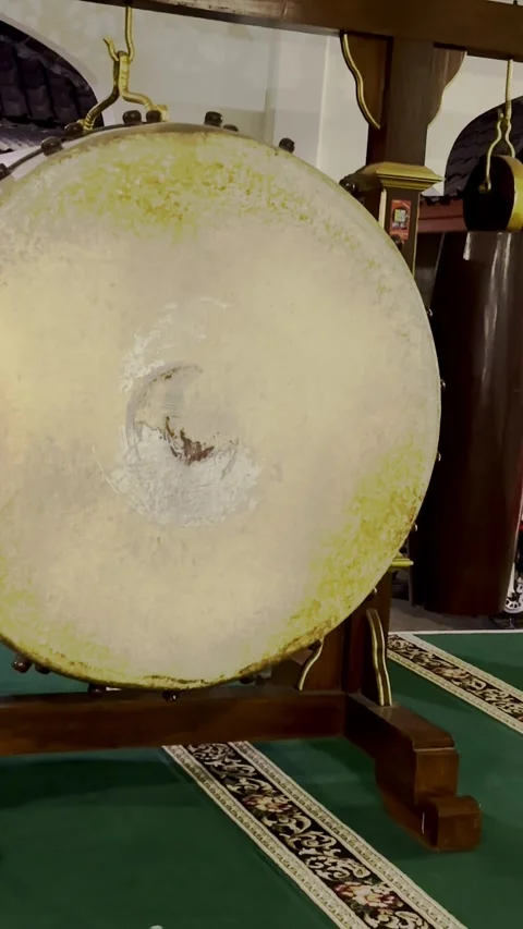 Traditional Indonesian bedug drum displayed on wooden frame Stock Footage 346741754