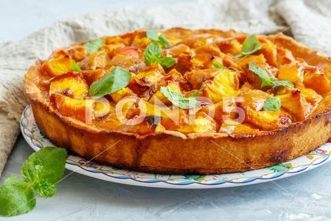 Traditional Italian pie with peaches. Stock Photos