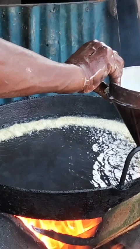 Traditional Jalebi Making Process in a Street Food Stall. Stock Footage 323540141