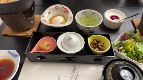 Traditional Japanese breakfast set on table Stock Footage 339330866