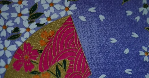 Traditional Japanese Patterns with Cherry Blossoms and Decorative Fan Stock Footage 341993763