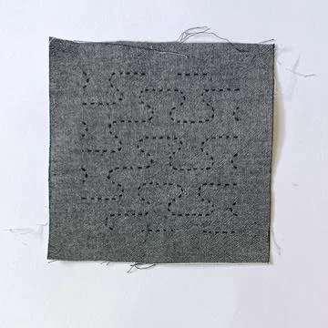 Traditional Japanese Sashiko Pattern Sample on Textile. Stock Photos