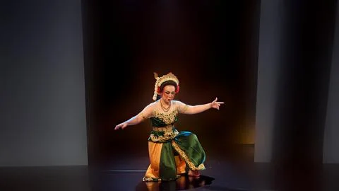 Traditional Javanese Dancer in Low Classical Stage Pose Stock Photos
