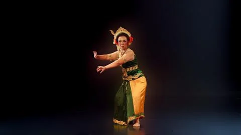 Traditional Javanese Dancer in Low Classical Performance Pose Stock Photos