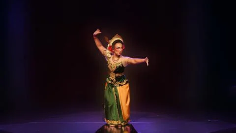 Traditional Javanese Dancer Performing Elegant Classical Hand Gesture Stock Photos