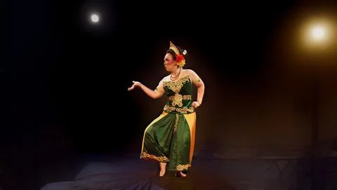 Traditional Javanese Dancer Presenting Delicate Side Gesture Stock Photos