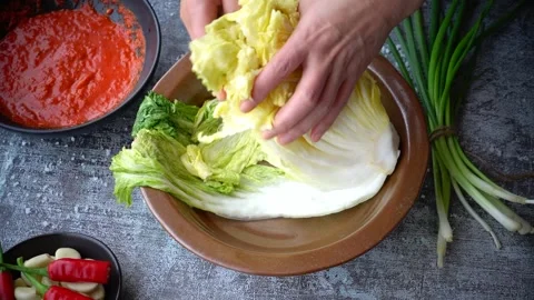 Traditional Kimchi Making Process Stock Footage 334904737
