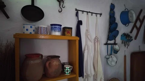 Traditional kitchen exhibit with pottery and utensils in a museum interior Stock Footage 336505676