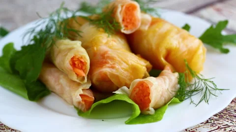 Traditional Korean marinated cabbage rolls with carrot and herbs Stock Footage 342146846