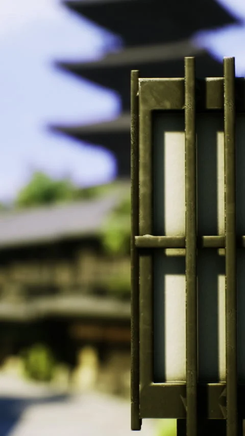 Traditional lantern guiding paths in a serene Japanese village during daytime Stock Footage 329939924