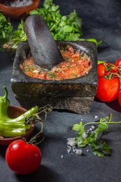 Traditional Latin American mexican Tomato sauce salsa, chilean chancho en ... Stock Photos