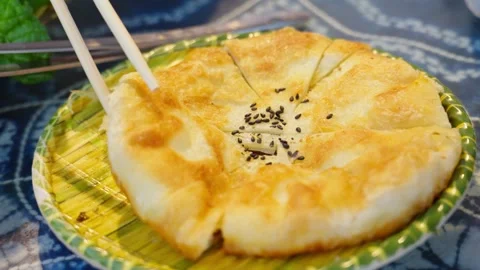 Traditional Lijiang Baba Flatbread with Crispy Crust Stock Footage 312450203
