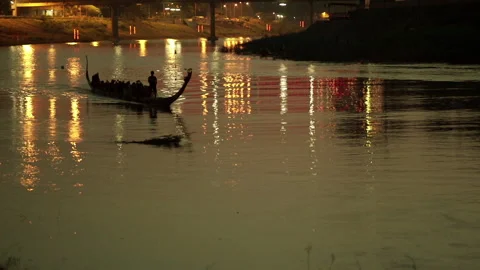 Traditional Long Boat Practicing Rowing at night Stock Footage 247452558