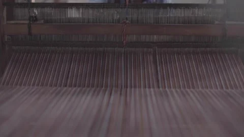 A traditional loom weaving threads Stock Footage 248799183