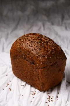 Traditional malt bread loaf with aromatic caraway seed crust Stock Photos