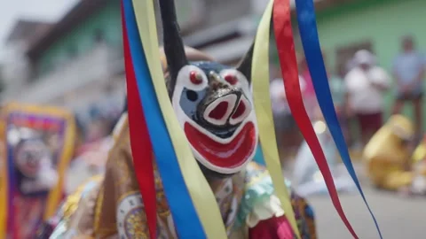 Traditional mask of a Dancing Devil in a religious celebration 動画素材 312915331