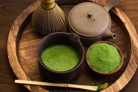 Traditional Matcha Tea Set. A rustic setup with matcha tea powder Stock Photos