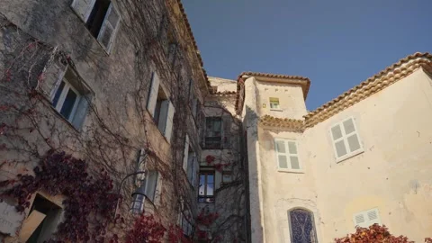 Traditional medieval architecture with red ivy in Eze village, France 動画素材 339098341