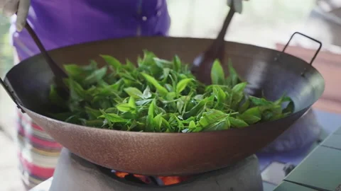 Traditional method of drying tea leaves Stock Footage 169981334